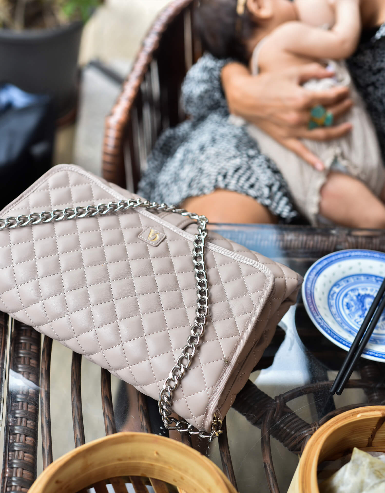 Diaper bag with metal strap