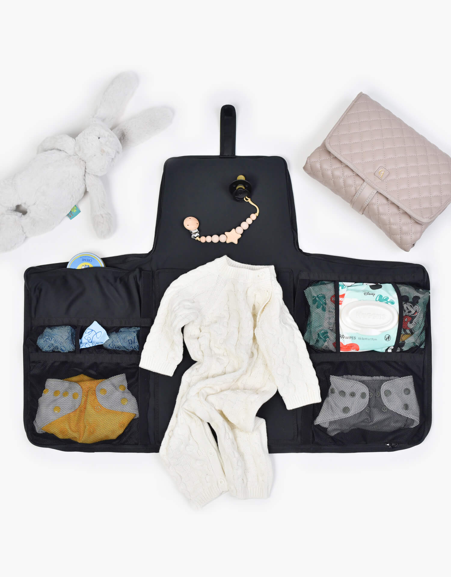 Diaper bag opened as baby Changing Station